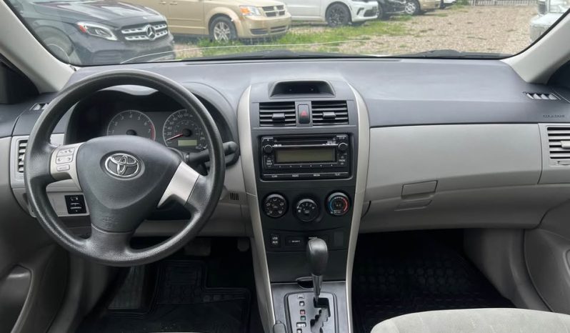 
								2013 Toyota Corolla full									